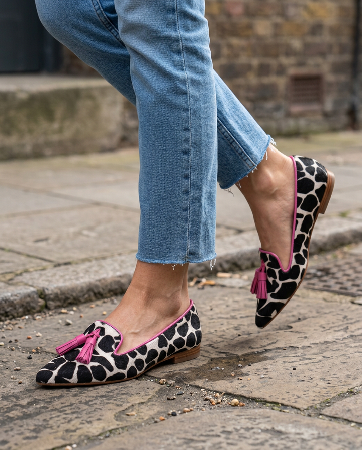 Ginevra Loafers | Black and White Cow Print, Pink Tassels