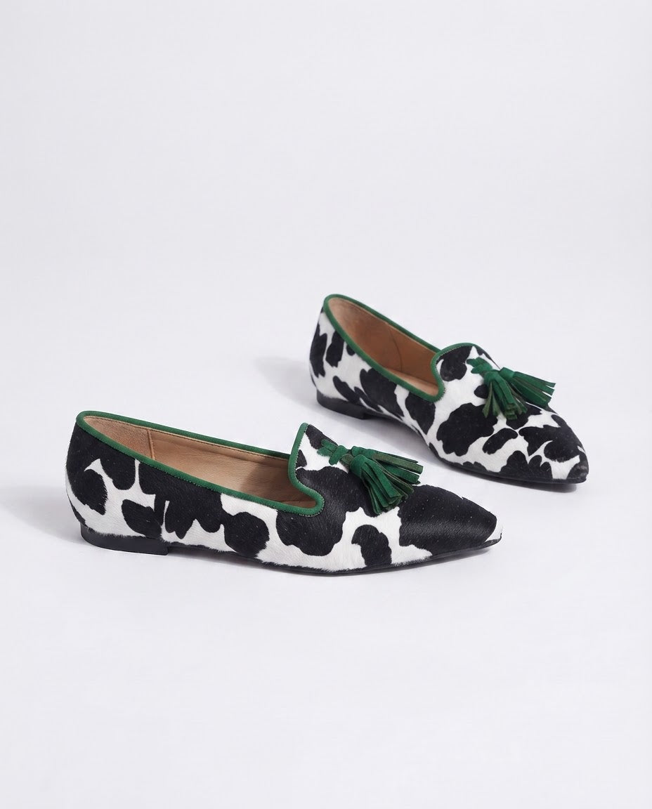 Ginevra Moccasin | Black and White Cow Print, Green Tassels
